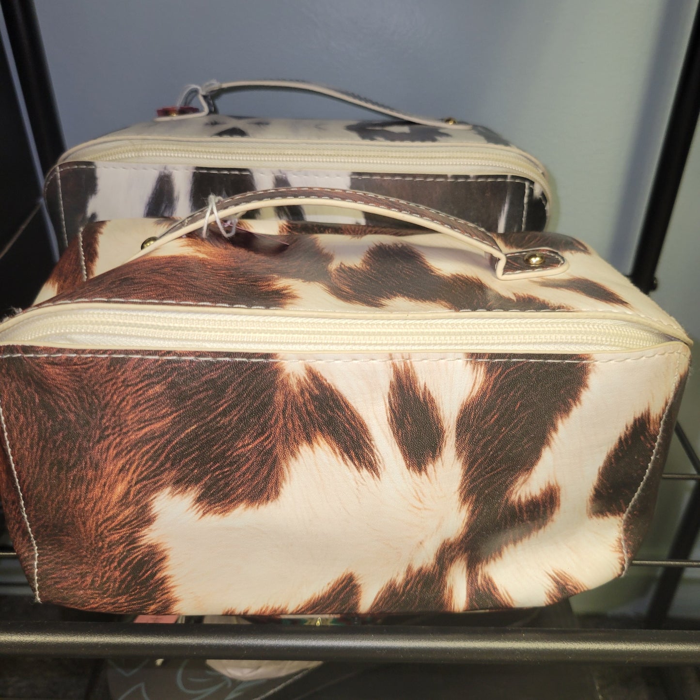 Saving Grace Tee Co- Cow print makeup bag